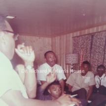 Martin Luther King, Jr. strategizing with Freedom Riders at the Richard Harris House May 1961.